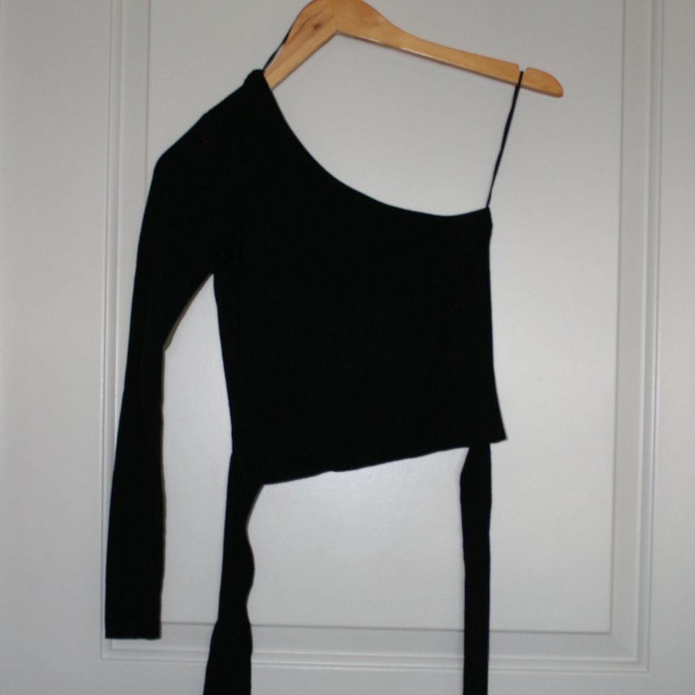 Black crop top with one arm.
